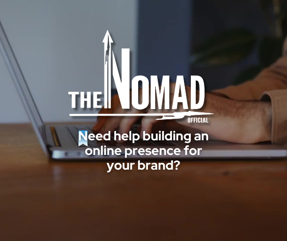 The background is a person writing onto a notebook. The body text reads: The Nomad Official is here to elaborate on topics such as: SEO, Social Media Tactics, Content Tips